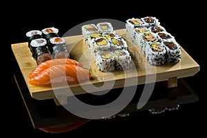Sushi on a stand ÃÂÃÆÃËÃÂ¸ ÃÂ½ÃÂ° ÃÂ¿ÃÂ¾ÃÂ´ÃÂÃâÃÂ°ÃÂ²ÃÂºÃÂµ photo